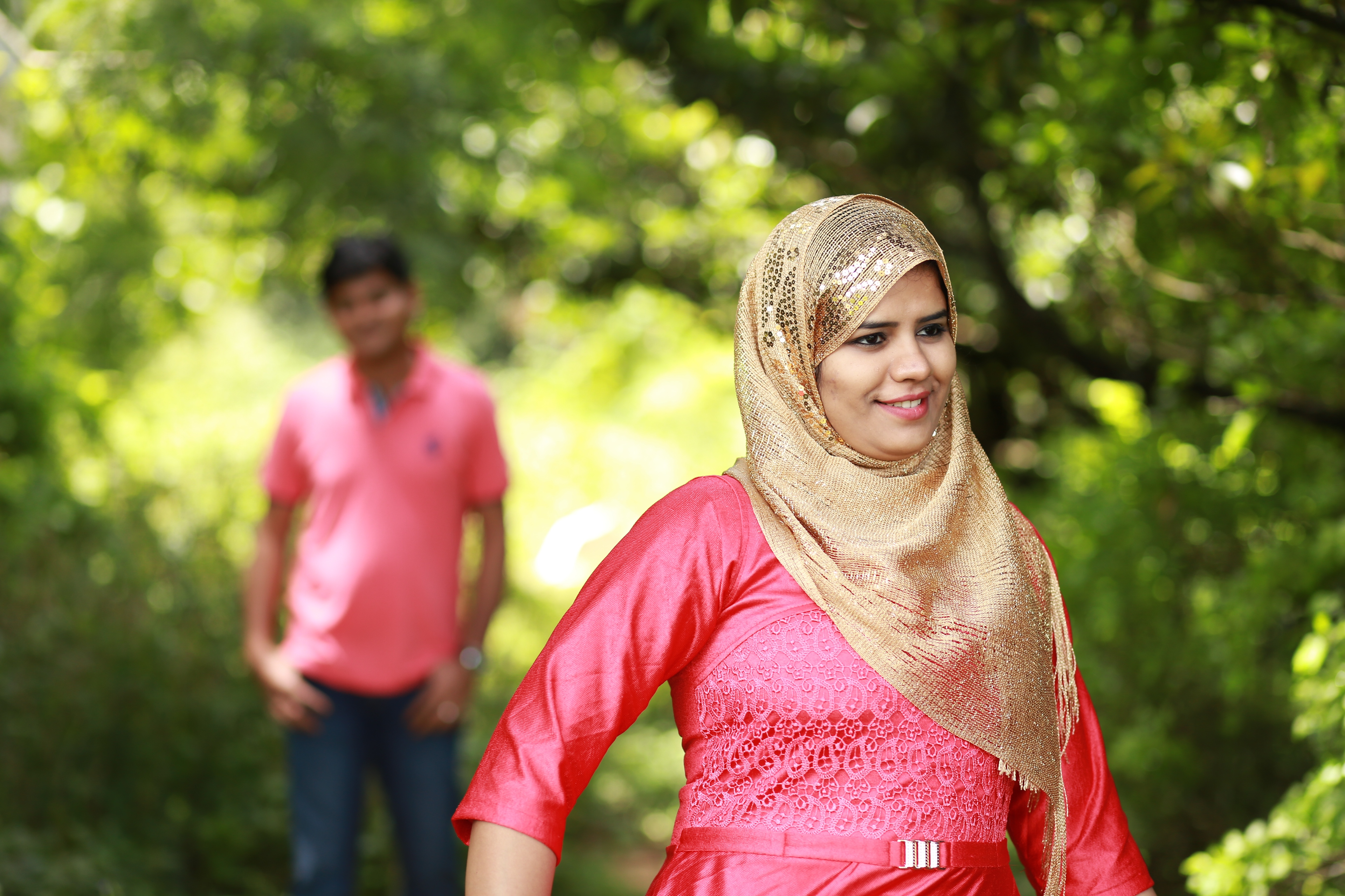 A romantic shot of a groom looking at his bride during their Kannur wedding.