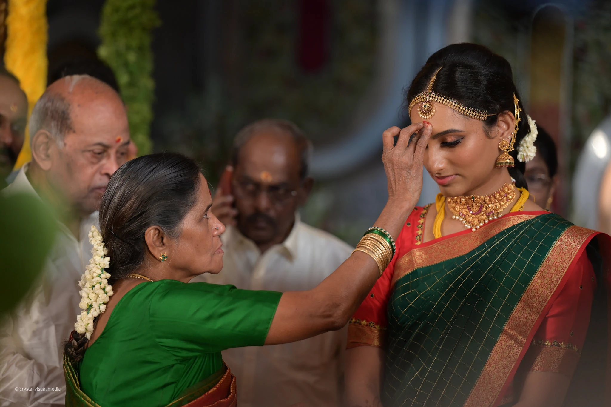 Bride in traditional attire at a destination wedding.