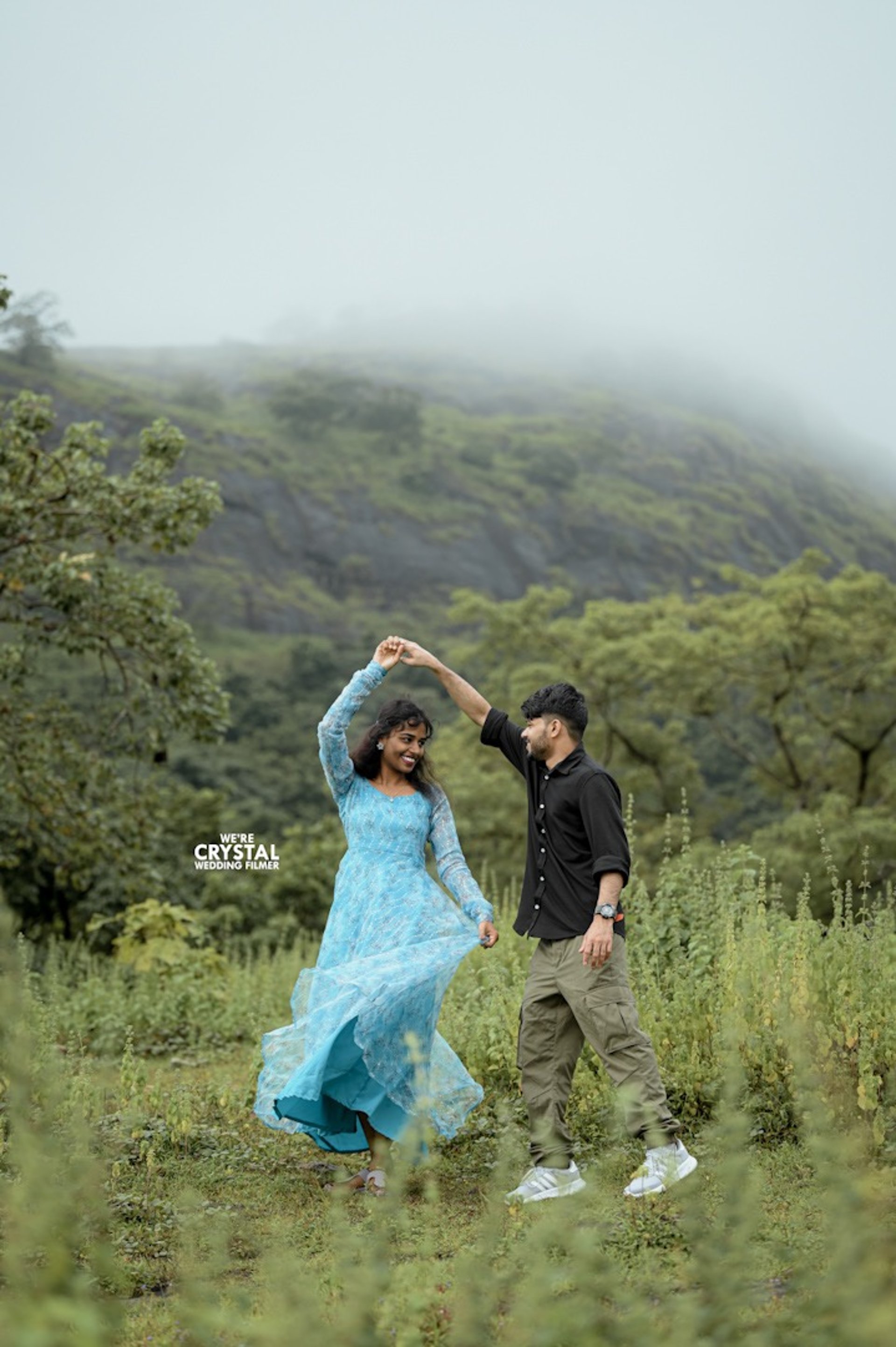 Save the date picture of couple in a kerala backwater resort.