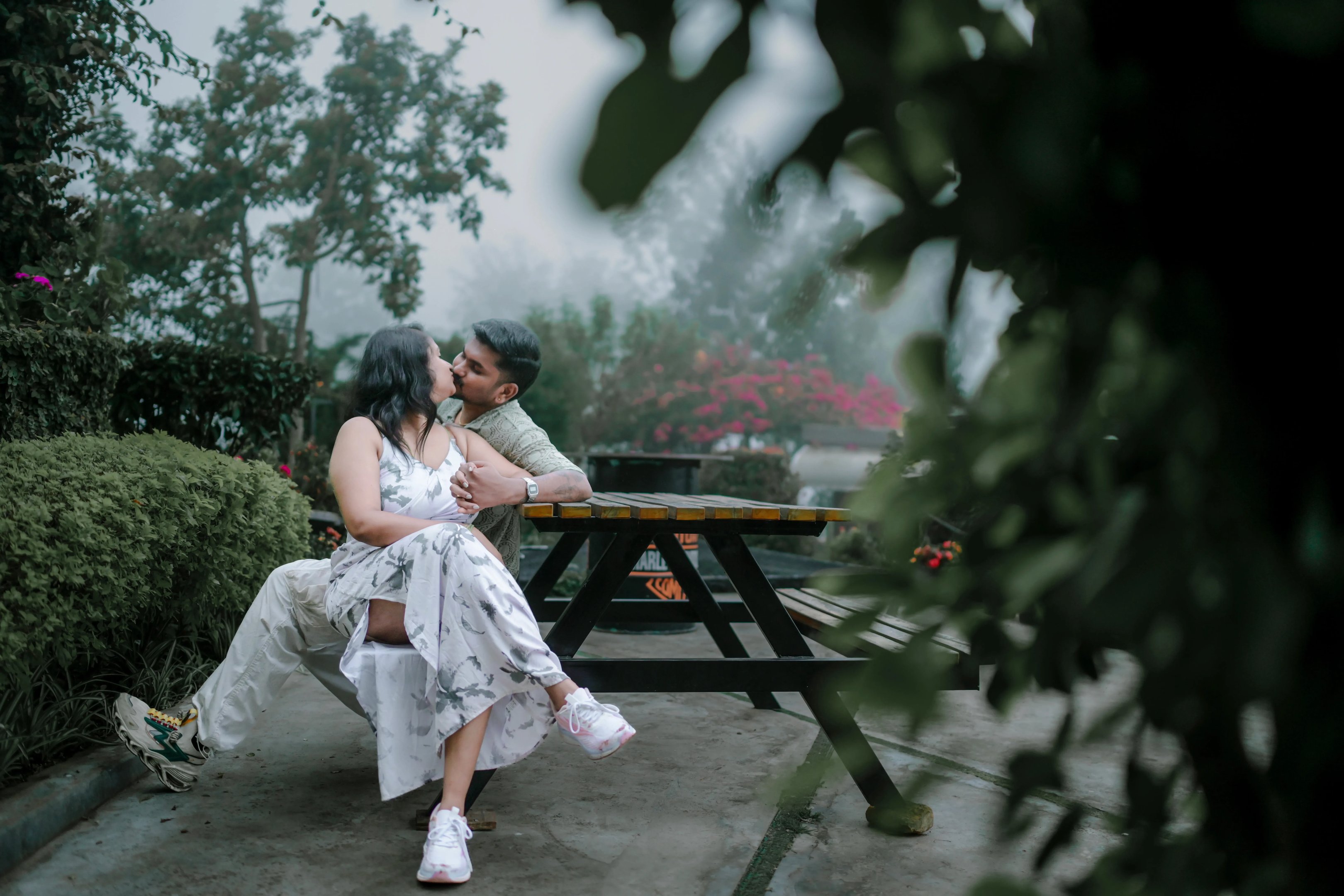A cinematic shot of the couple in the Ooty tea gardens, captured by Crystal Wedding Filmer.