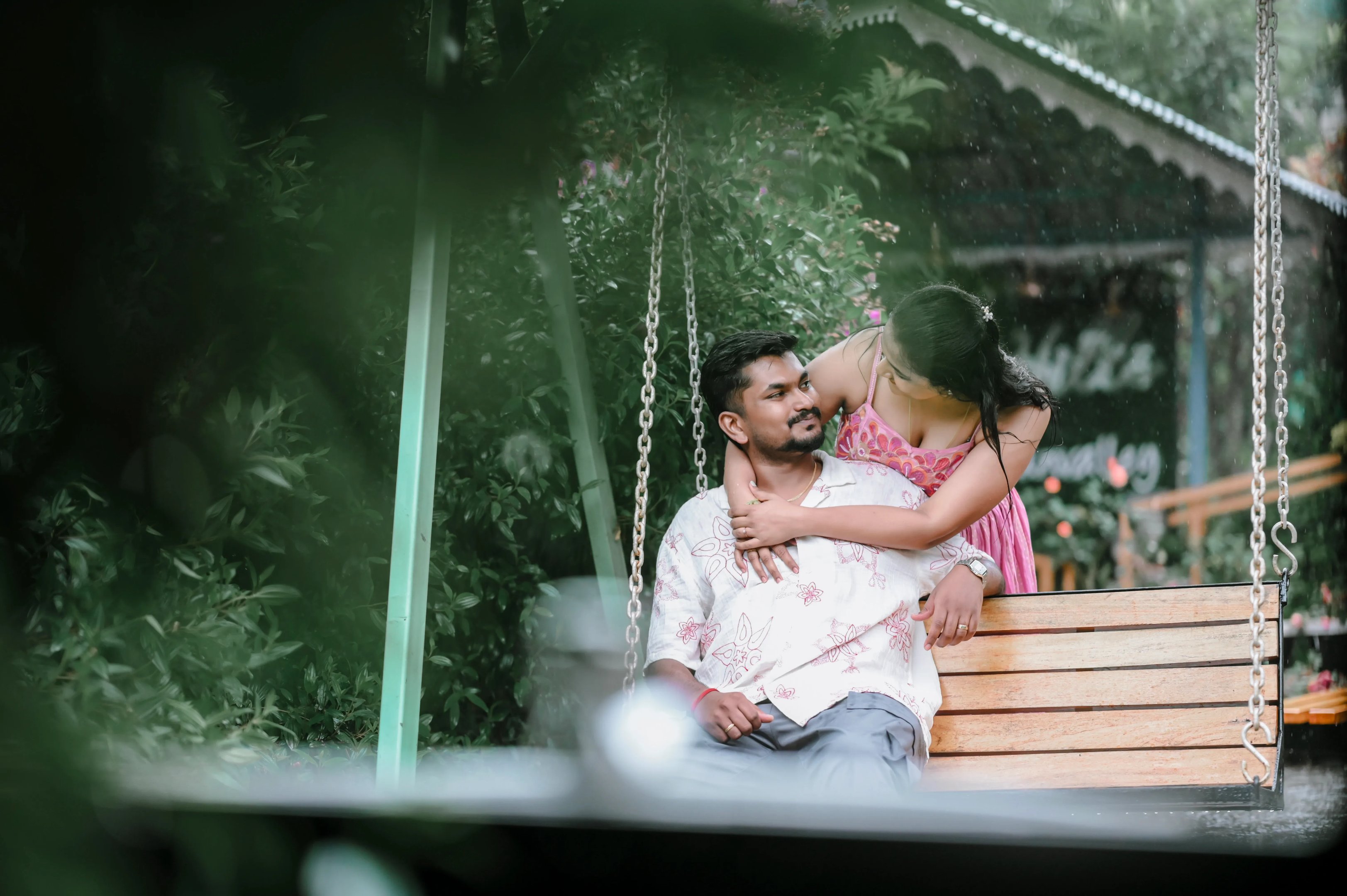 A candid of Sruthi laughing, a highlight from their Ooty save the date story.